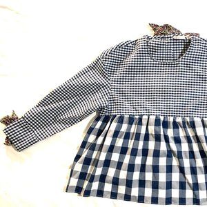 Multi-designed top